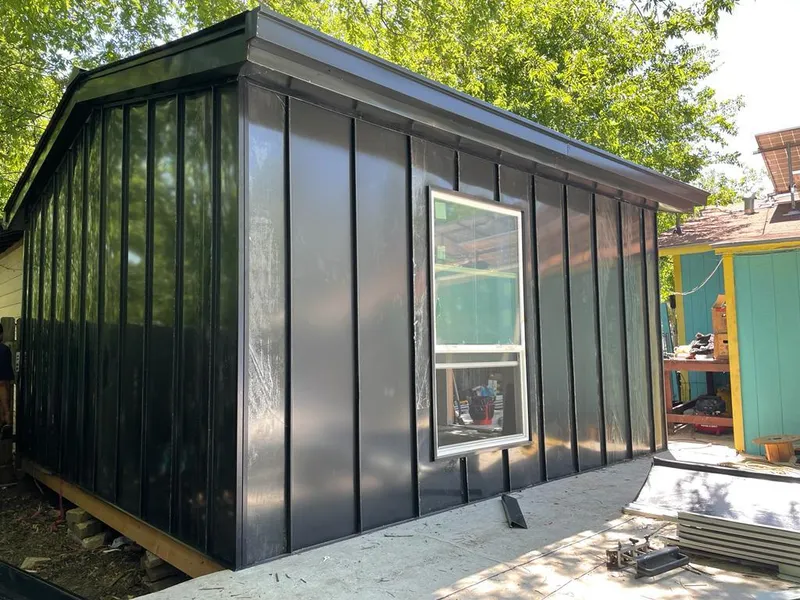 Black standing seam metal wall panels for Roof Inspection in Ocoee