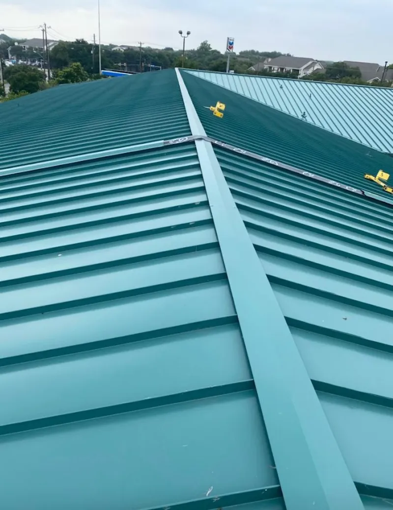 Green commercial metal roof ridge and valley for Metal Roof Repair in Ocoee